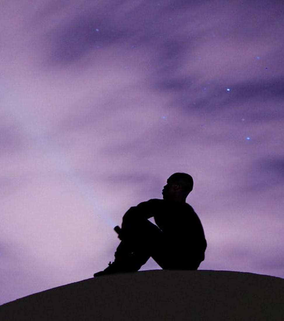 Man, sitting and thinking